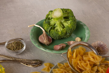 Broccoli on kitchen table of vegetarian cuisine, close up