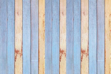 Old wooden wall in light blue and yellow vintage style texture and background