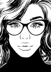 Attractive woman in glasses with beautiful hair