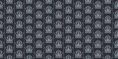 Royal background pattern. Gray crowns on black background. Seamless wallpaper texture
