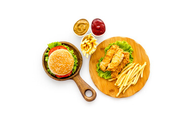 Overhead view of fast food - burger and french fries, flat lay