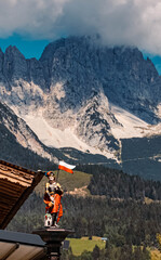 Beautiful alpine summer view with a Saint Florian statue at Ellmau, Wilder Kaiser, Tyrol, Austria