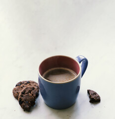 Sunday afternoon snack coffee and chocolate chip cookies. close up