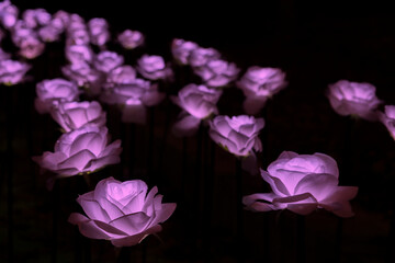 Handmade Flower with LED light at night. Artificial flower made of cloth
