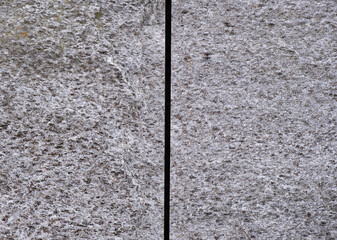 gray granite background cut in half, building wall