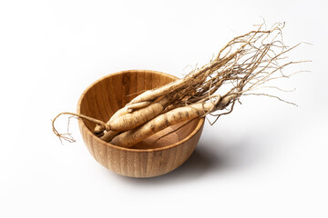Fresh ginseng on white background