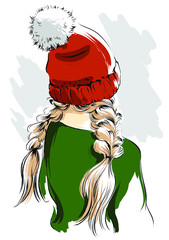Young woman in winter hat and double braid