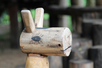 Fototapeta premium Wooden rocking horse on the ground.