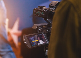 the operator shoots on the set with the camera