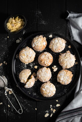 ‘Mandorlini’ biscuits on a wooden black table.