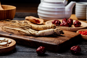 Ginseng and tea cup are on the table