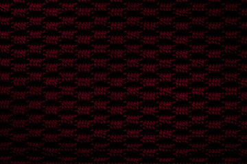 Dark red knitted fabric background texture