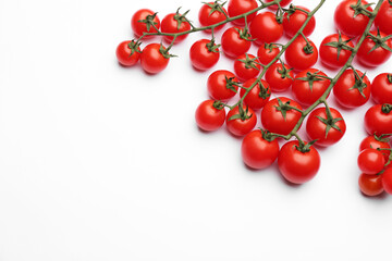 Fresh cherry tomatoes on white background, top view