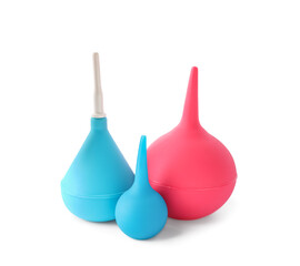 Different enemas on white background. Medical treatment
