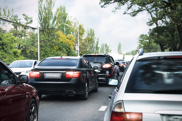 Naklejka premium Cars in traffic jam on city street