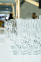 Table setting, many glass transparent glasses for wine and champagne