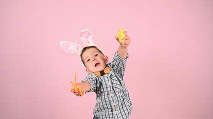 Baby with bunny ears and eggs