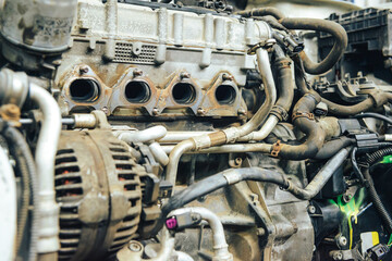 Close-up, internal combustion engine repair. The restoration of the demolished car after the accident.