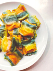 colored rainbow ravioli. food photo