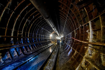 Deep underground metro tunnel. Construction of a subway line in the Dnipro city, Ukraine. August 2017