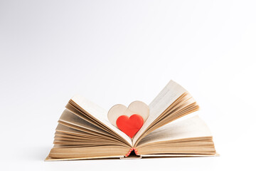 open book with heart symbol inside. love reading concept. valentine day greeting card conceptual