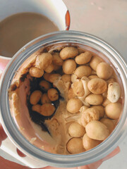 delicious peanut butter cream with chunks of cookies and chocolate, top view