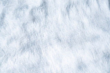 Close up white shaggy artificial fur texture or carpet for background.