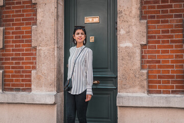 Young beautiful urban business woman going to work