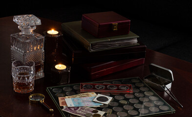 numismatics still life, in evening along at home
