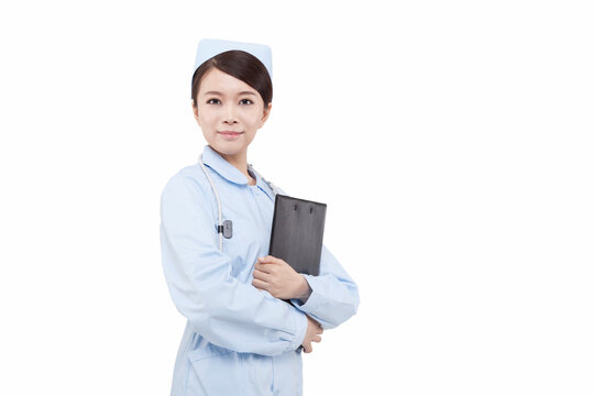 Portrait of a young doctress holding X-ray