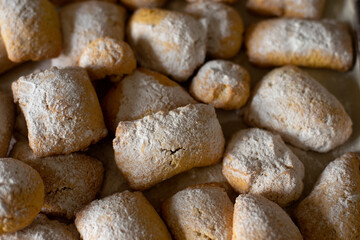 Fototapeta na wymiar Homemade cookies as a background, typical italian pastry product. Carnival cookies. Nobody. 