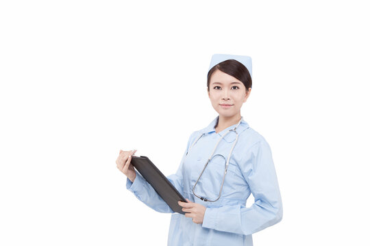 Portrait of a young doctress holding X-ray