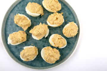 stuffed eggs with tuna and mayonaisse sauce as snack food