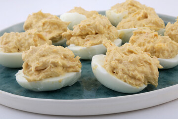 stuffed eggs with tuna and mayonaisse sauce as snack food