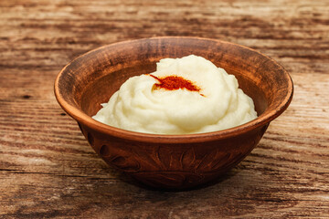 Mashed potato in antique ceramic bowl