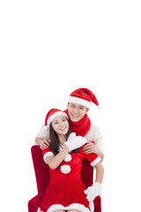 Portrait of young couple wearing Santa hats,smiling