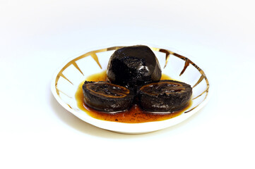 Walnut jam in a saucer