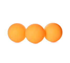 Orange plastic balls for table tennis on white background