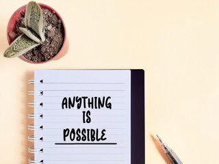 Inspirational and motivational concept - text ANYTHING IS POSSIBLE background. Stock photo.