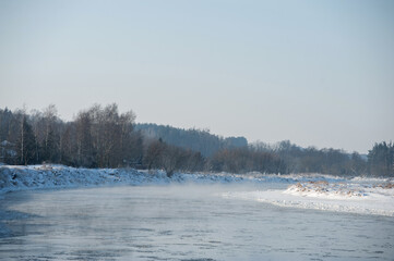 Frozen river, sunny January day
