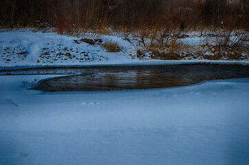 beautiful winter landscape with snowy trees and river