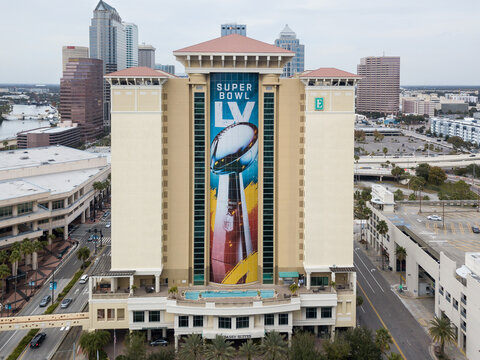 View of the Embassy Suites by Hilton with the Super Bowl LV Vince Lombardi trophy with Downton Tampa in the Background