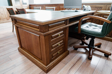 Executive cabinet with wooden office desk in classic style