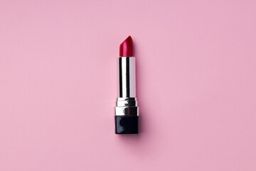 Lip make up product on pink background