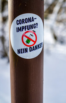 sticker against corona vaccination in germany