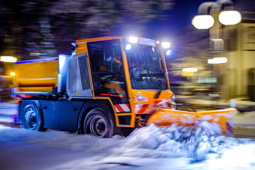 truck cleaning the streets in winter