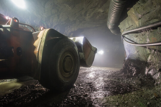 Underground gold ore mine shaft tunnel gallery passage with load, haul, dump machine LHD Toro