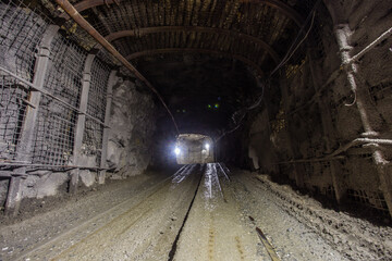 Underground gold mine shaft tunnel drift with light