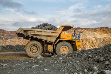 Dump truck minetruck on a mining site gold ore quarry
