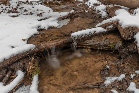 Winter waterfall near Moravsky Krumlov town in winter cold morning